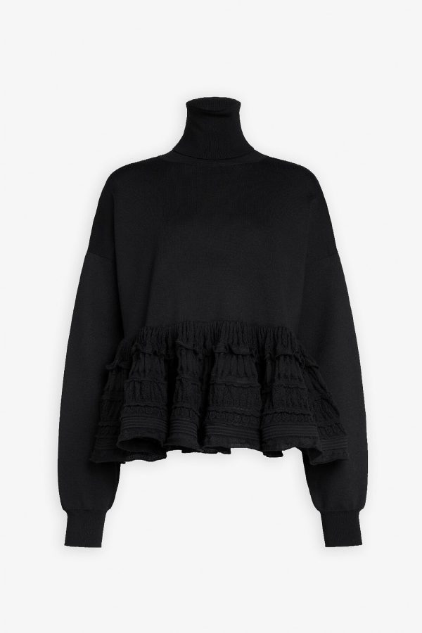 Alaia black peplum jumper at Savannah's